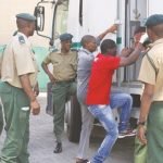 zim-men-botswana-police-arrest