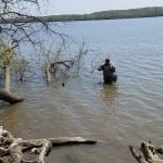 man fishing crocodile dam_600x400