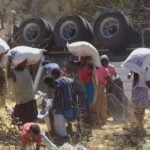 truck overturns loot maize accident