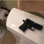 gun-in-toilet